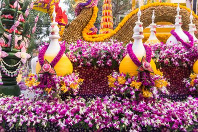 The parade cars are decorated with many kinds of flowers in annual 42th Chiang Mai Flower Festival, Thailand.