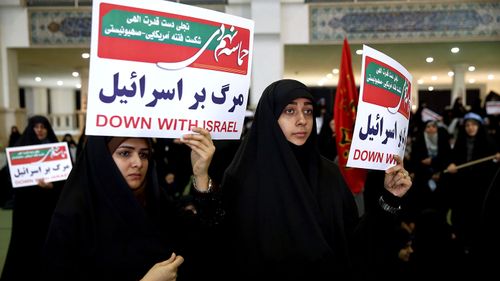 Thousands gather for pro-government rally in Iran