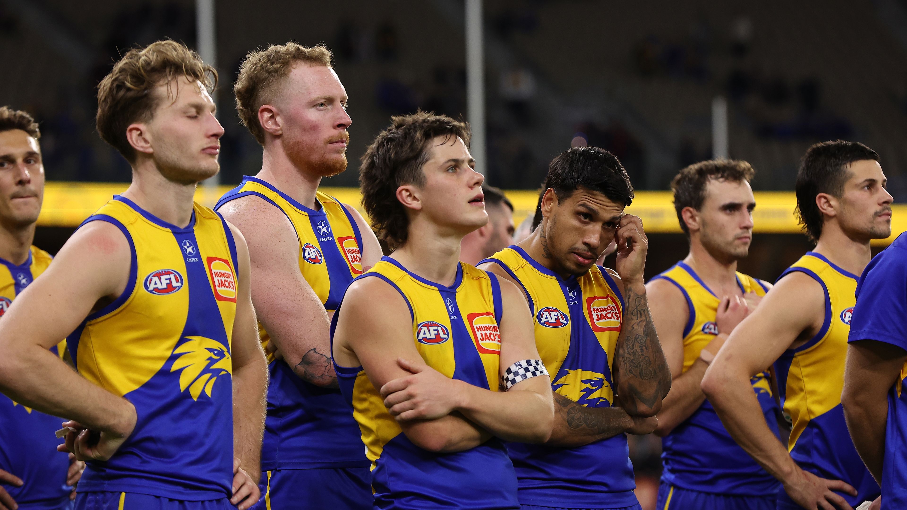 PERTH, AUSTRALIA - AUGUST 12: The Eagles look on after being defeated during the round 22 AFL match between West Coast Eagles and Fremantle Dockers at Optus Stadium, on August 12, 2023, in Perth, Australia. (Photo by Paul Kane/Getty Images)