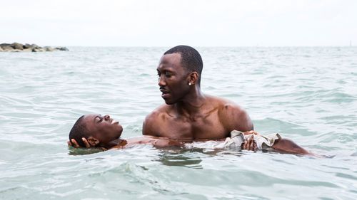 Moonlight was the actual Best Picture winner. Pictured in a still from the film are Alex Hibbert, foreground, and Mahershala Ali. (AAP)