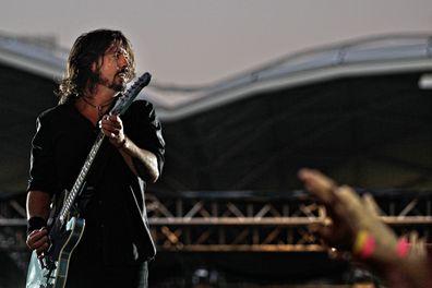 Foo Fighters lead singer Dave Grohl performs on stage in front of 30,000 fans at AAMI Park in Melbourne. 2 December 2011.  