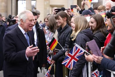 King Charles III meets members of the public during the Ceremonial welcome at Brandenburg Gate on March 29, 2023 in Berlin, Germany.