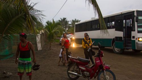 Colimo residents prepare to leave their village before the hurricane hits. (AFP)