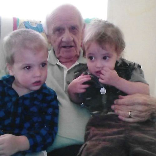 Mr Cooper with his grandchildren Caleb (left) and Emma-Lee. 