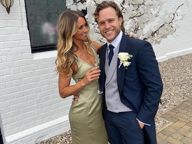 Singer Olly Murs is engaged to girlfriend Amelia Tank.