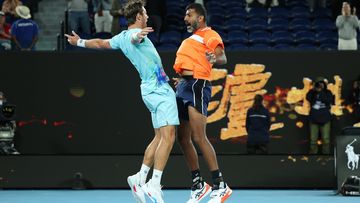 Matthew Ebden of Australia and Rohan Bopanna of India celebrate winning championship point in their Mens Doubles Final match against Simone Bolelli and Andrea Vavassori of Italy during the 2024 Australian Open at Melbourne Park on January 27, 2024 in Melbourne 