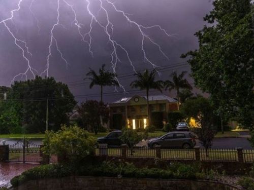 Lightning hits above a home in East Killara, in Sydney's north (Insgram: @dan.seto)