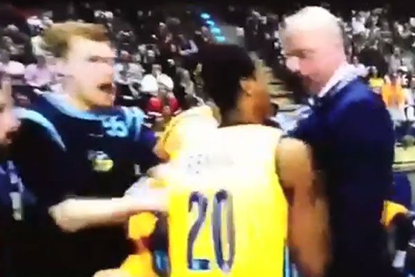 Basketball coach, player nearly punch on
