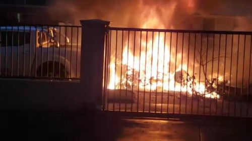 Witnesses captured the ignited plane which narrowly avoided homes in the residential street. (9NEWS)