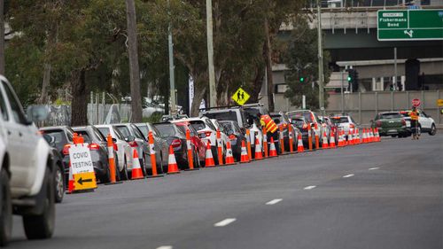 A line of cars as people wait to get tested in South Melbourne.
