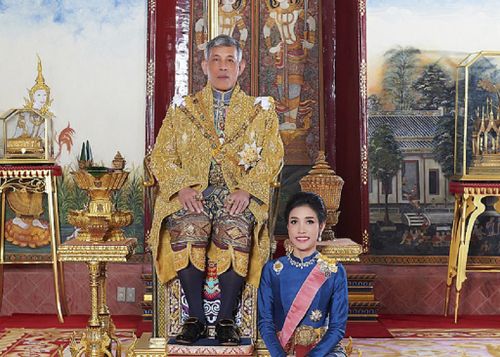 The King of Thailand with his former royal consort.