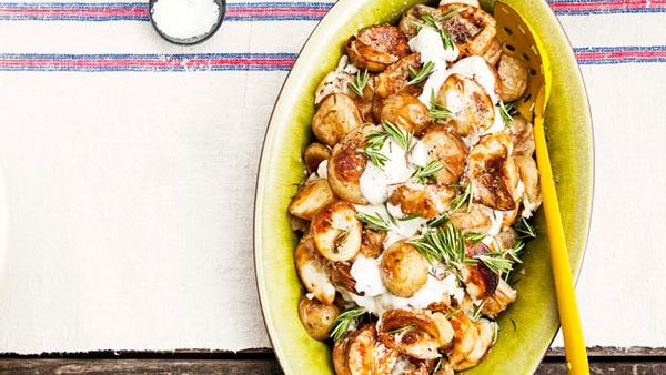 Smashed baby potatoes with roasted garlic & rosemary cream