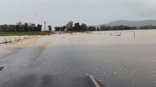 Floodwaters on a road in NSW