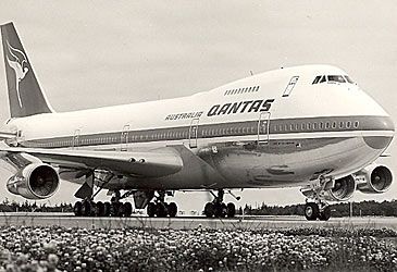 When did Qantas take delivery of its first Boeing 747?
