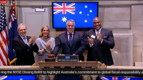 Joe Hockey rings the bell at the New York stock exchange. (Supplied)