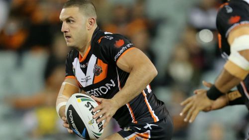 NRL star Robbie Farah has vowed to stay with the Wests Tigers, despite taking stress leave recently. (AAP)