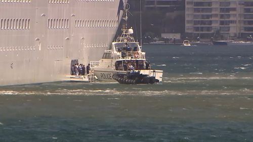 P&amp;O Cruises’ Pacific Explorer asked NSW Police Marine Area Command to escort the group from the ship. (9NEWS) 