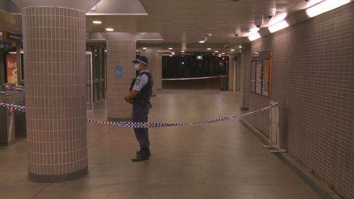 A man has died after he allegedly walked into a Sydney police station with a knife and was shot.