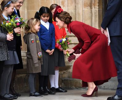 The Duchess of Cambridge greets children outside Westminster Abbey on March 9, 2020.