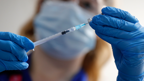 A nurse prepares to administer the Pfizer-BioNTech COVID-19 vaccine at Guys Hospital in London, Tuesday, Dec. 8, 2020. U.K.  (AP Photo/Frank Augstein, Pool)