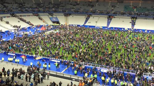 Patrons at the stadium are being kept on the field for their safety. (@maximedupuis)