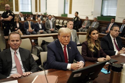 Former President Donald Trump sits in the courtroom with his legal team before the continuation of his civil business fraud trial at New York Supreme Court, Tuesday, Oct. 17, 2023, in New York.  
