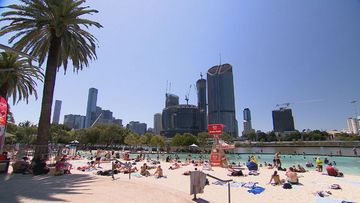 Many Queensland residents opted to head outdoors, with families flocking to the beach at Southbank to cool off, as the mercury rose to the mid 30s across the state&#x27;s south-east.