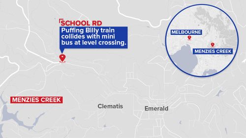 Police said the mini bus clipped the train just before noon. (9NEWS)