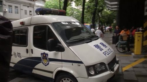 Police presence outside court in Guangzhou. (Supplied)