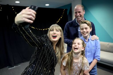 Taylor Swift takes a selfie with Prince William, Prince George and Princess Charlotte at Wembley Stadium, London