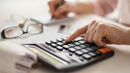 Using a calculator to budget finances