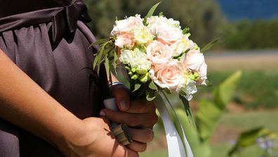 Pregnant woman at wedding