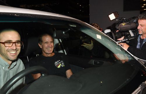 A jubilant James Ricketson is driven from Sydney Airport after landing from Cambodia.