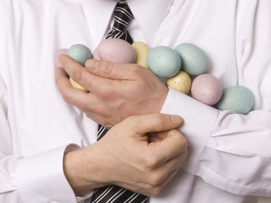 Man holding Easter eggs
