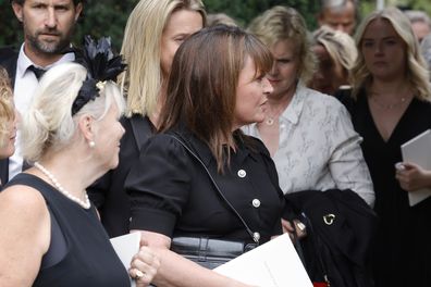 Lorraine Kelly departs the funeral of Dame Deborah James at St Mary's Church on July 20, 2022 in Barnes, England. 
