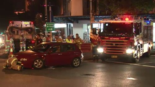 Two cars collide at busy intersection in Surry Hills, Sydney