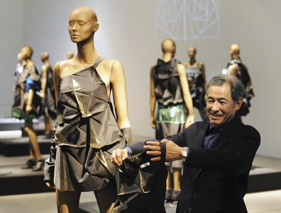 Fashion designer Issey Miyake explains about his new cloth at Midtown in Minato Ward, Tokyo on December 15, 2015. 