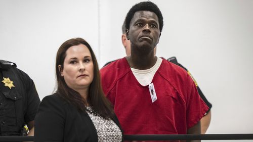  Wesley Brownlee stands with public defender Allison Nobert during his arraignment in San Joaquin County Superior Court on Tuesday, Oct. 18, 2022. Prosecutors have charged Brownlee with fatally shooting three men whom police have said were among six victims slain by a serial killer over the past year and a half.  (Hector Amezcua/The Sacramento Bee via AP)