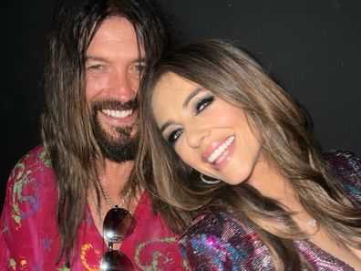 Elizabeth Hurley and Billy Ray Cyrus at the premiere of Something Beautiful