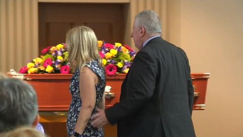 Faye and Mark Leveson before the coffin the the funeral for Matthew.