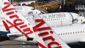 Grounded Virgin Australia planes are seen at Tullamarine Airport in Melbourne