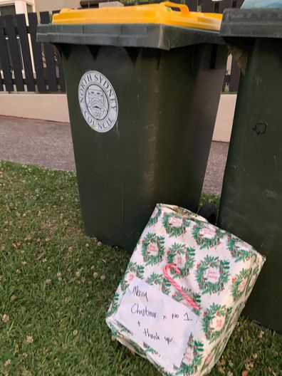 stolen christmas gift garbage collectors