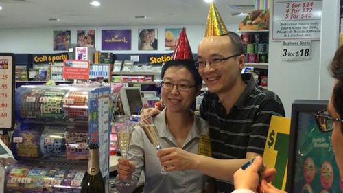 Staff at the newsagency celebrate the win. (Harvey Biggs, 9NEWS)