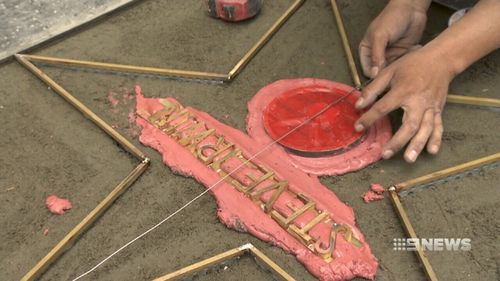 The finishing touches have been applied by hand to Irwin's star. Picture: 9NEWS.