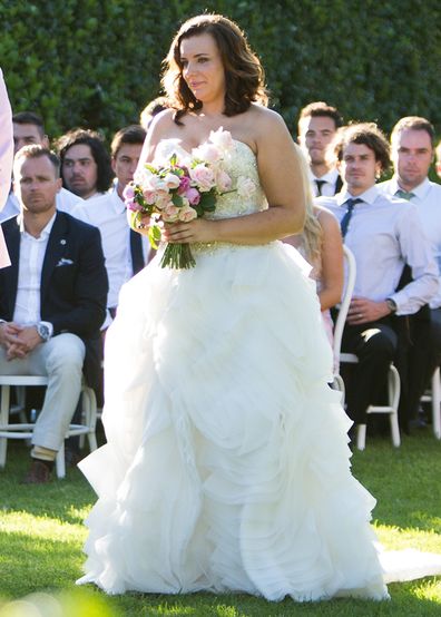 Jess' dress provided by The Sposa Group.