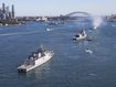 Navy vessels during military exercises in front of the Sydney Harbour Bridge