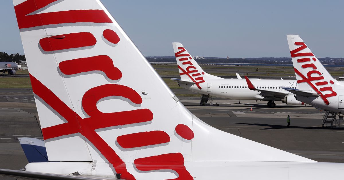 Virgin Australia apologises for delays after global system outage resolved