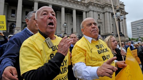 Taxi drivers voiced anger over the state government's license buy-back scheme. (AAP)