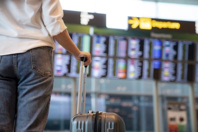 Woman standing at airport