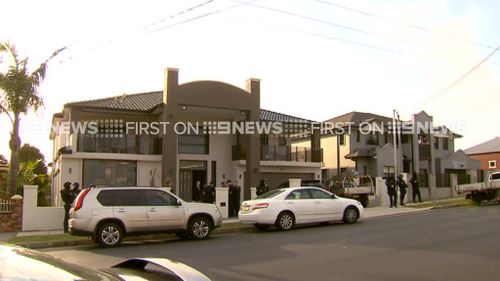 The Merrylands home raided by police. (9NEWS)